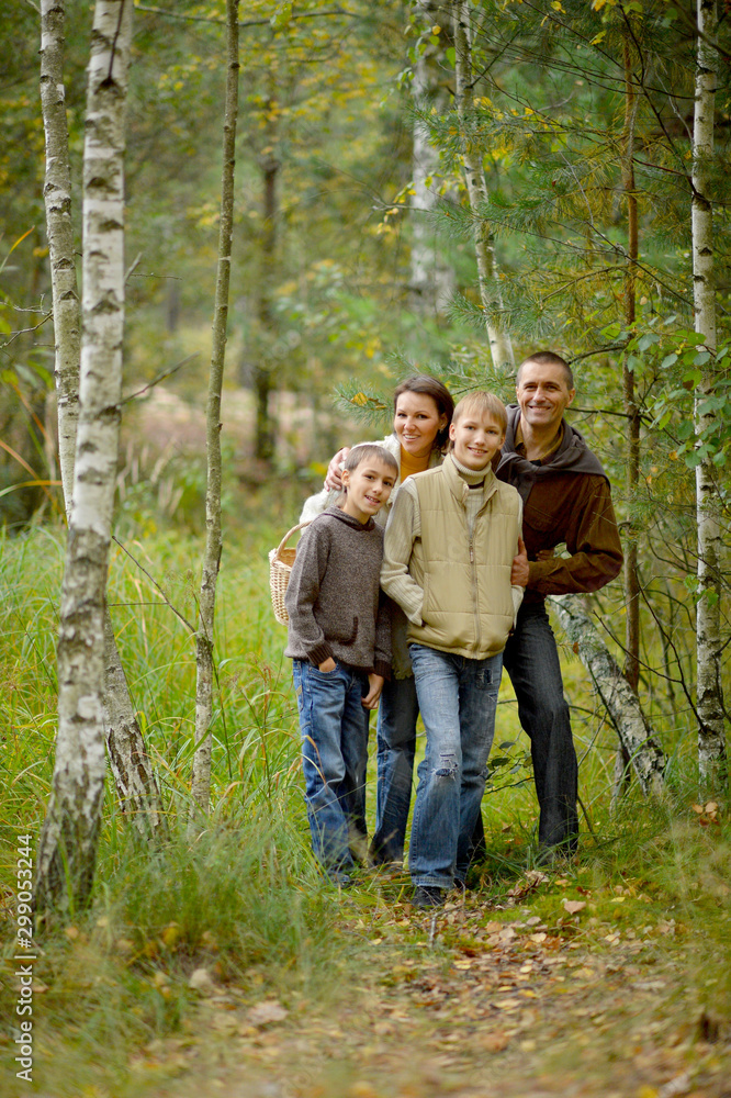 Portrait of family of four in park Portrait of family of four in park
