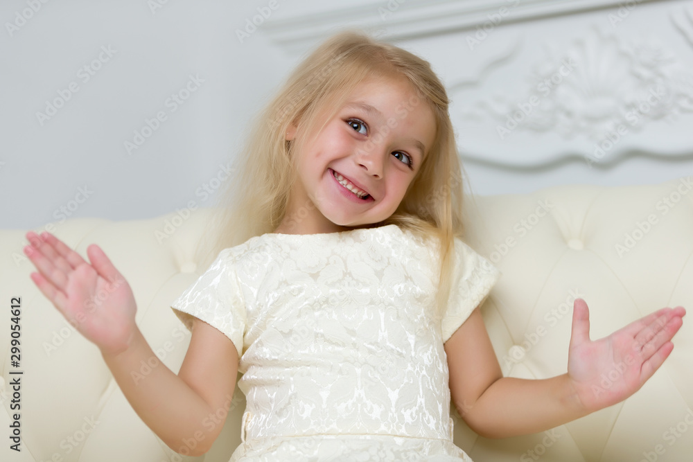 Little girl posing in the studio. Close-up. Little girl posing in the studio. Close-up.