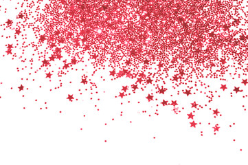 Red glitter and glittering stars on light gray background