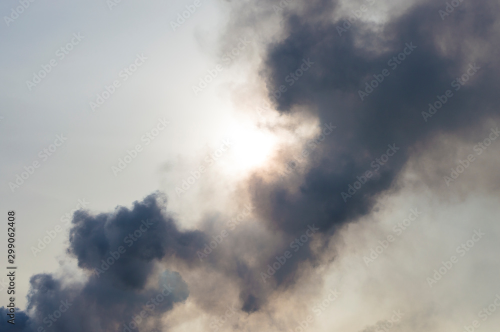 black smoke against the sky