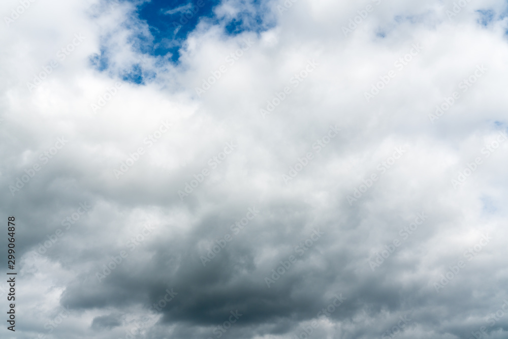 Fototapeta premium stormy cloudy sky with patches of blue and white clouds