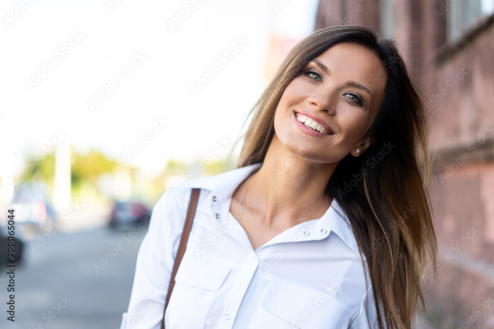 Portrait of a successful business woman smiling Portrait of a successful business woman smiling