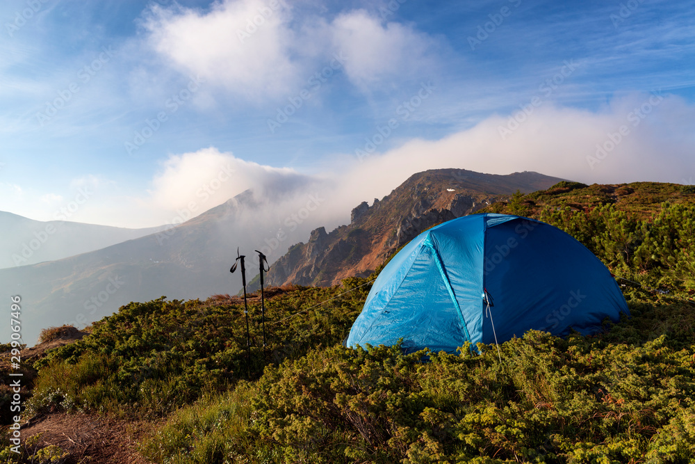 Tourist tent in a wild mountains