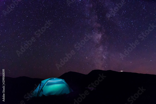 Night sky with stars and Milky Way in the mountains