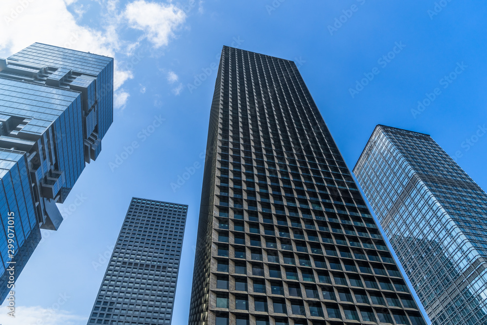 modern office building against blue sky.