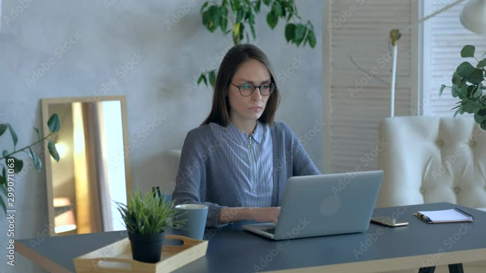 Serious business woman end working on laptop in office and go out drink coffee. Remote working from home concept. Medium shoot. Concept break at work. Serious business woman end working on laptop in office and go out drink coffee. Remote working from home concept. Medium shoot. Concept break at work.