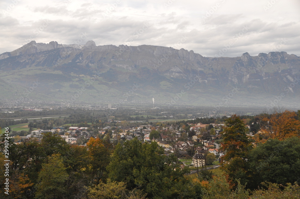 view over the river Rhine valley to Switzerland from Vaduz on an autumn afternoon, Lichtenstein, Europe