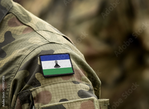 Flag of Lesotho on military uniform. Army, troops, soldiers. Collage.