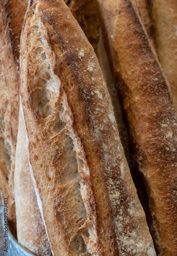 Close up of sour dough bread baguette loaves, photographed at a bakery near Bruton in Somerset, UK.