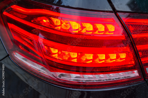 Tail lights (rear lights, brake lights) of car close up image © Vladyslav