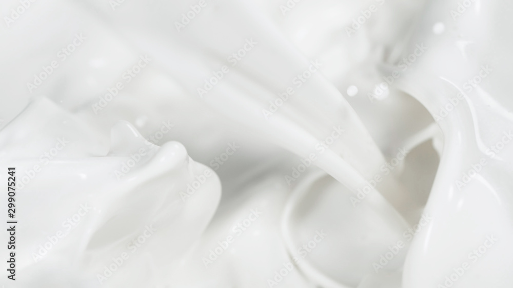 Macro shot of pouring cream in detail Macro shot of pouring cream in detail