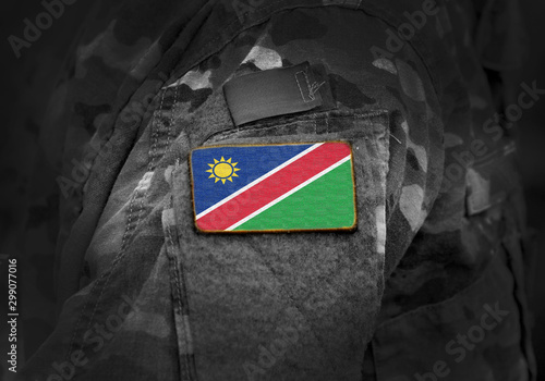 Flag of Namibia on military uniform. Army, troops, soldiers. Collage.