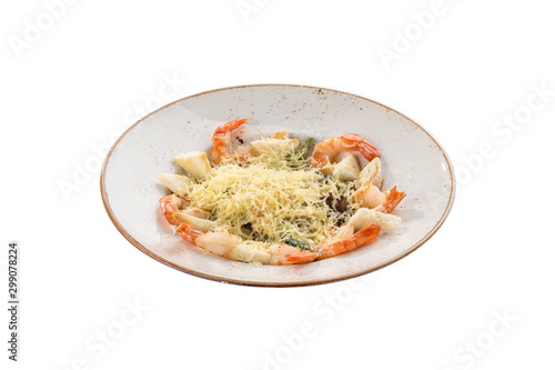 Healthy Grilled Caesar Salad with shrimp, parmesan Cheese and Croutons isolated on white background