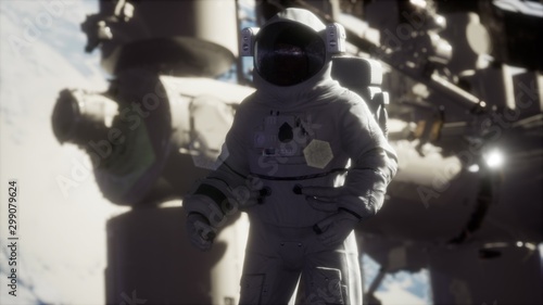 8K Astronaut outside the International Space Station on a spacewalk photo