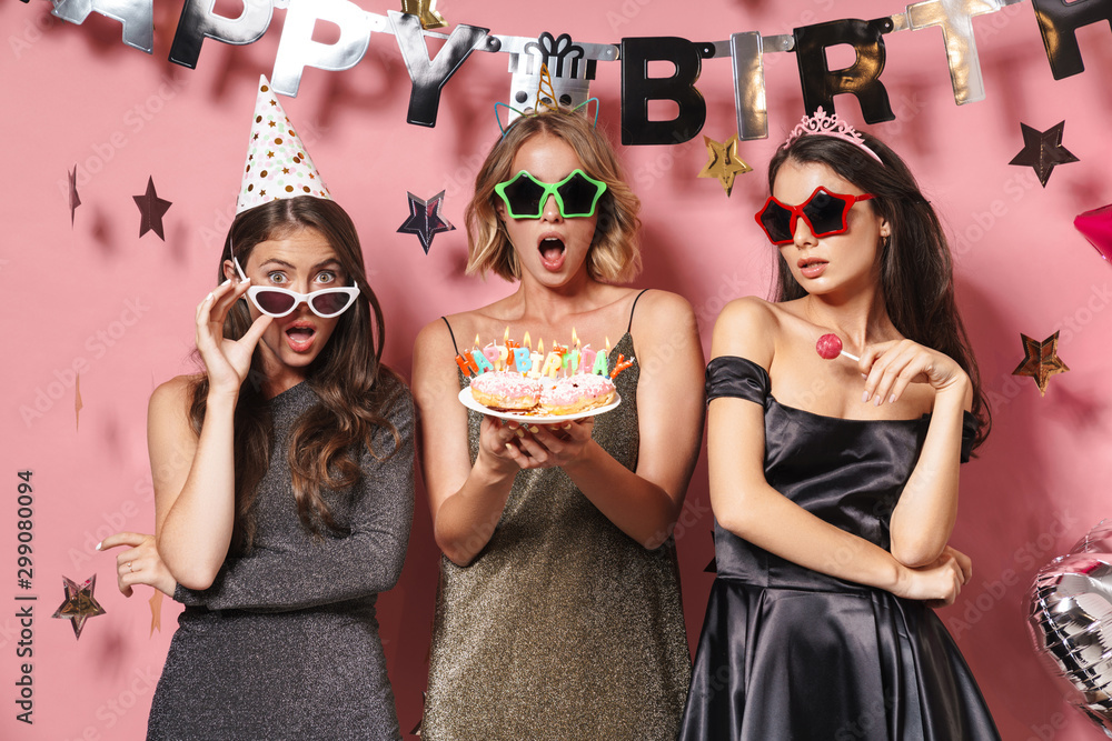 Image of adorable party girls in glamour sunglasses holding birthday cake Stock Foto Adobe Stock