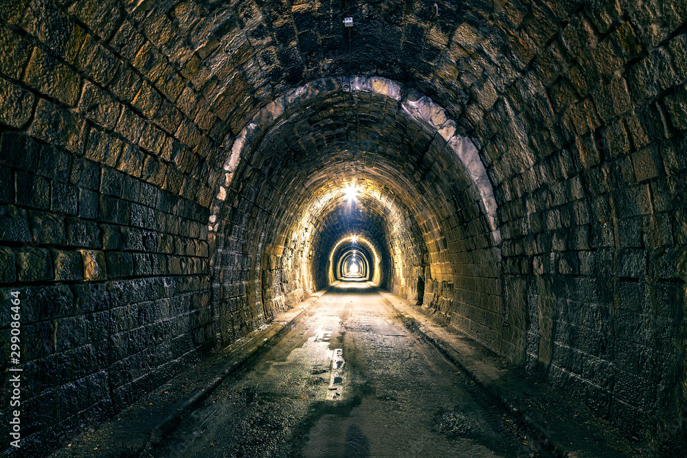 Old road tunnel with lights. Margecansky tunel/Margecany tunnel. Kosice region in Slovakia. Old road tunnel with lights. Margecansky tunel/Margecany tunnel. Kosice region in Slovakia.