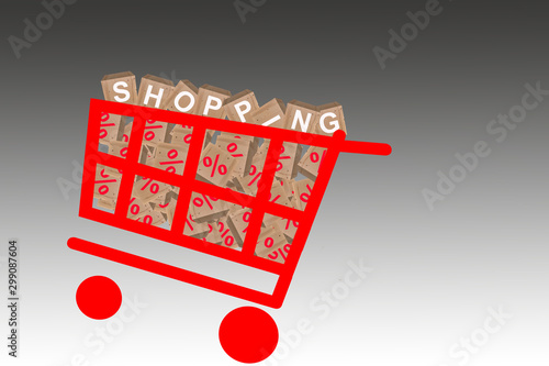 Einkaufswagen mit mit Würfel und der Aufschrift Shopping