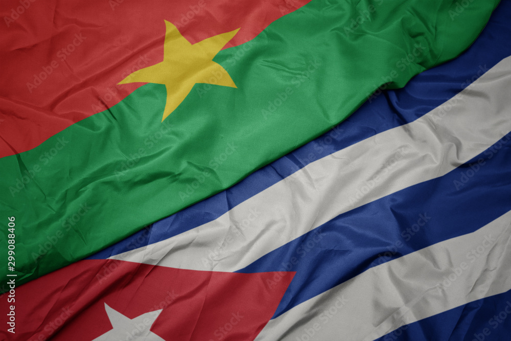waving colorful flag of cuba and national flag of burkina faso. waving colorful flag of cuba and national flag of burkina faso.