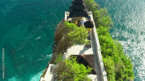 Bali, Indonesia, aerial view of Pura Luhur Uluwatu temple at sunrise. photo