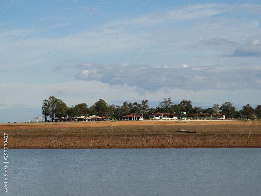 Fototapeta premium Rural Landscapes of Três Marias - Minas Gerais - Brazil, with houses, trees and lakes, and plants
