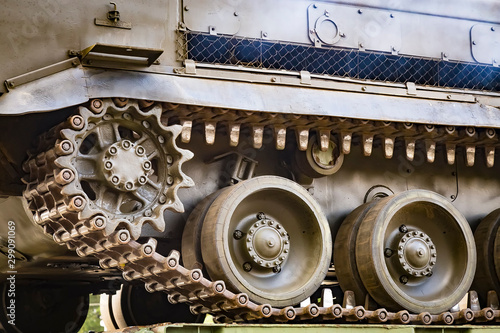 Closeup of green caterpillar track of the tank or Buk missile system standing. photo