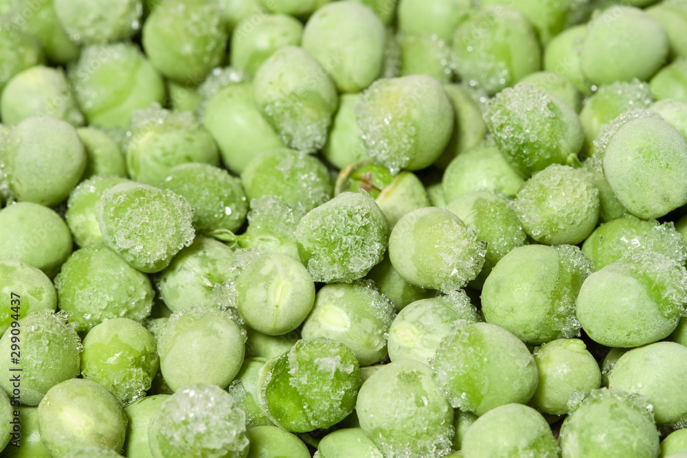 Frozen fresh peas with crystals ice macro closeup iced