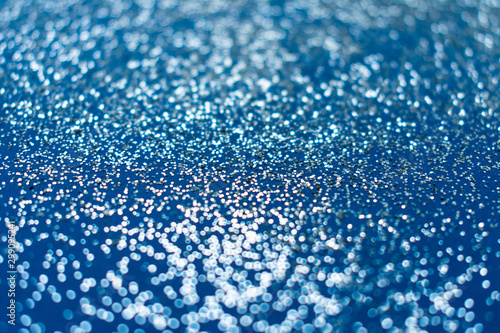  Blue shiny background of little sparkles.