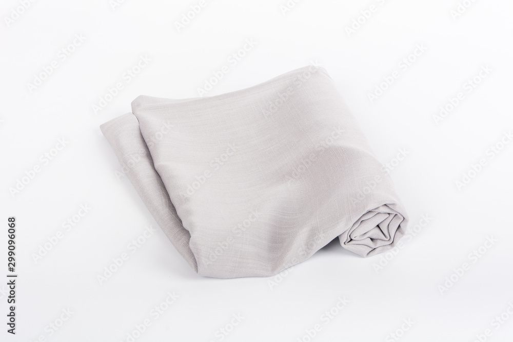 Neutral gray cotton and hemp cloth under white background Neutral gray cotton and hemp cloth under white background