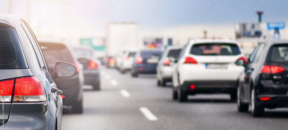 Traffic jam in city road. Cars on busy highway. Rush hours streets panorama or wide banner.