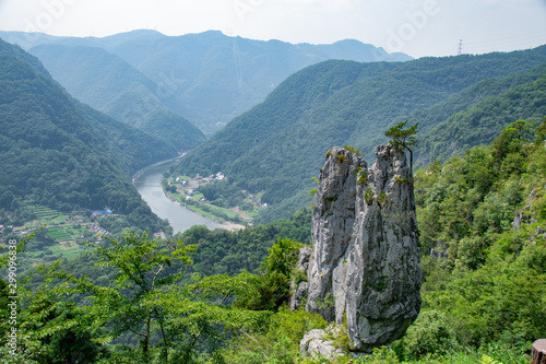 夫婦岩と成羽川　岡山県高梁市成羽町  Meotoiwa Rocks, the couple of rocks look like married couple, which symbolize the harmonious marriage, and Nariwa River in Nariwa town, Takahashi city, Okayama pref. Japan. photo