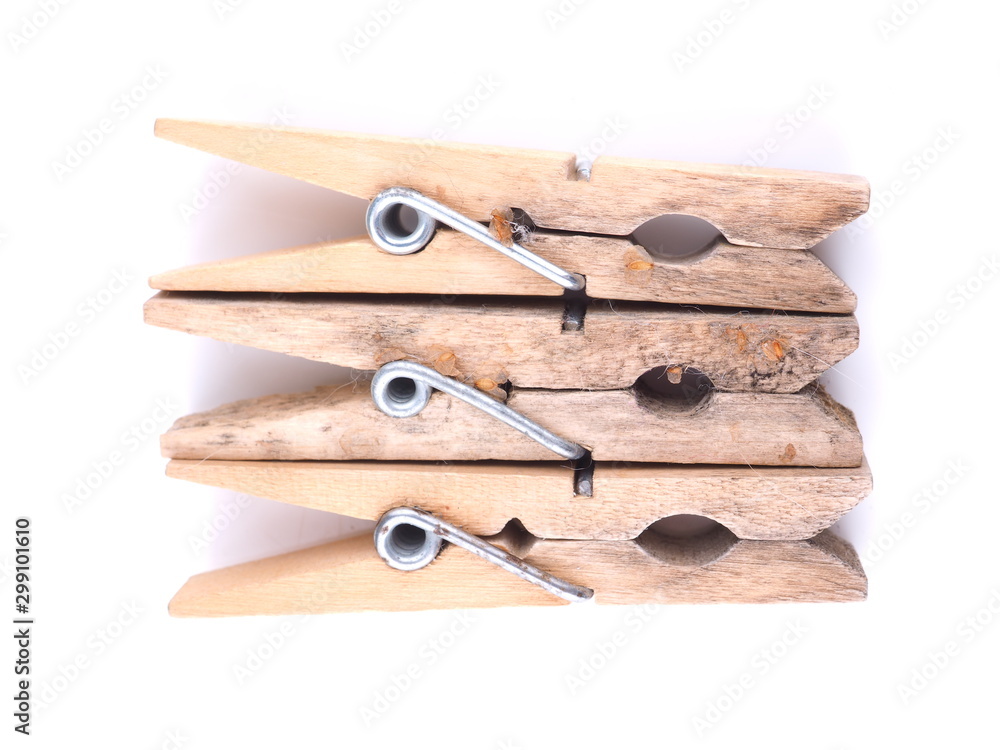 wooden clothespins on a white background wooden clothespins on a white background