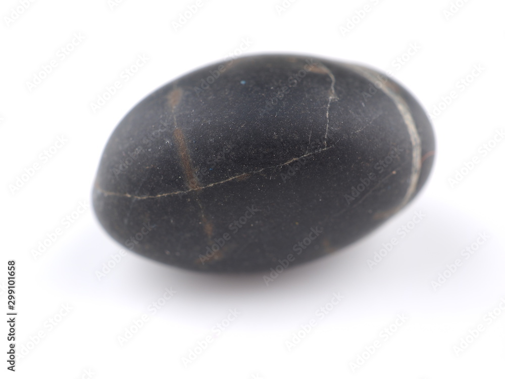 black stone on a white background black stone on a white background