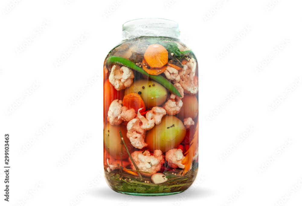 Various vegetables pickled in a jar isolated on white Various vegetables pickled in a jar isolated on white