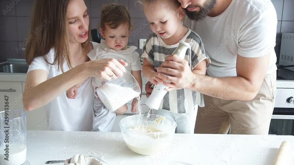 Two little girls learning to make perfect baker, pastry. secrets of cooking home-made food. Two little girls learning to make perfect baker, pastry. secrets of cooking home-made food.