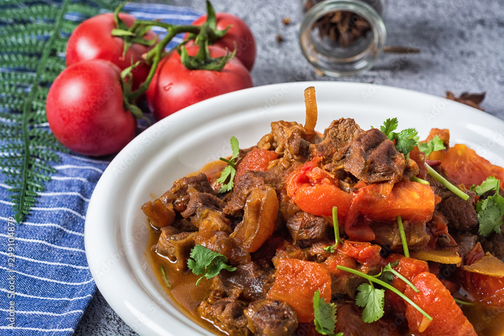 Chili con carne - in American English as simply chili, is a spicy stew containing chili peppers, meat (usually beef), tomatoes and often beans Chili con carne - in American English as simply chili, is a spicy stew containing chili peppers, meat (usually beef), tomatoes and often beans