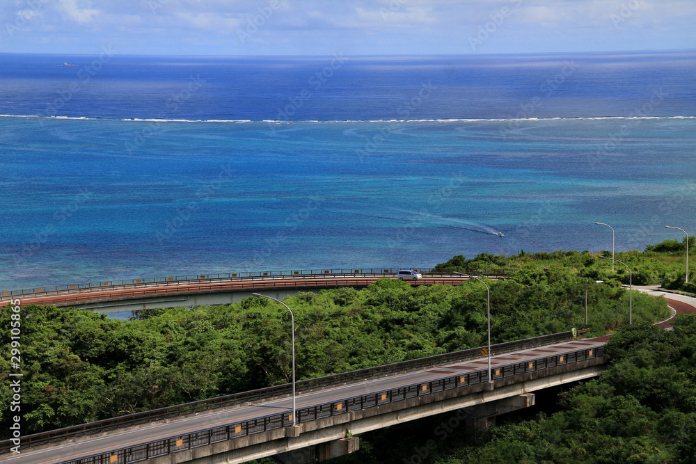 Niraikanai bridge near beautiful coral sea in Okinawa Niraikanai bridge near beautiful coral sea in Okinawa