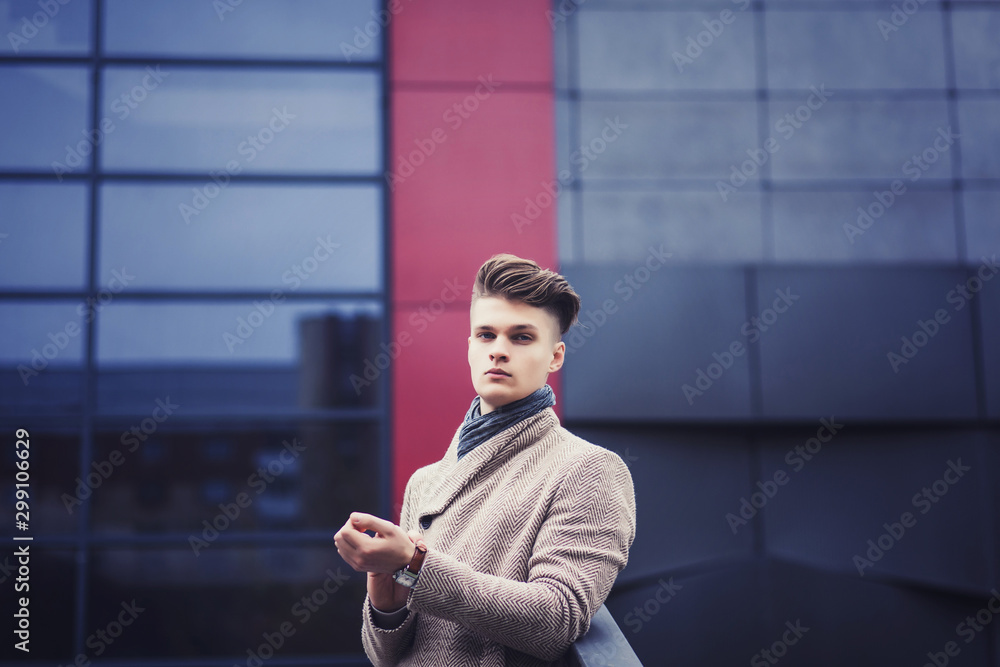 a successful man adjusts his coat sleeves in the city a successful man adjusts his coat sleeves in the city