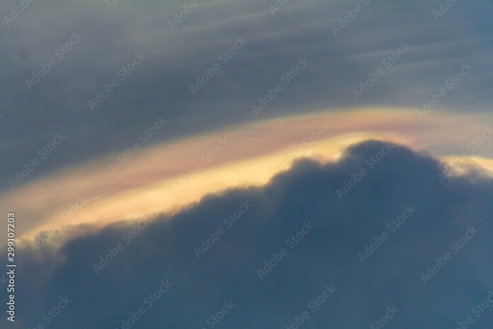 Beautiful iridescent cloud, Irisation. Skyscraper background Beautiful iridescent cloud, Irisation. Skyscraper background