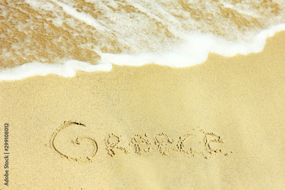 Fototapeta premium holiday inscription on the beach