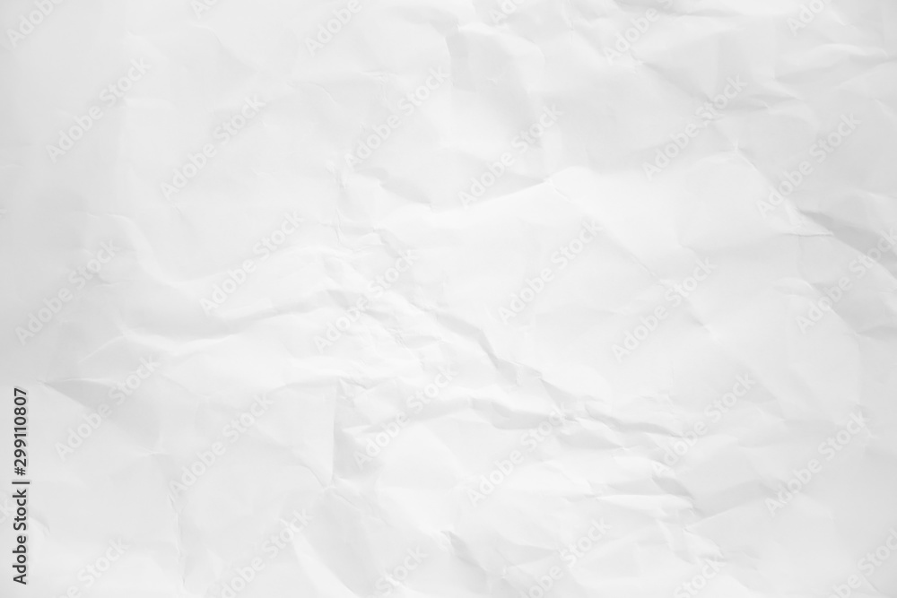 white and gray wide crumpled paper texture background. crush paper so that it becomes creased and wrinkled. white and gray wide crumpled paper texture background. crush paper so that it becomes creased and wrinkled.
