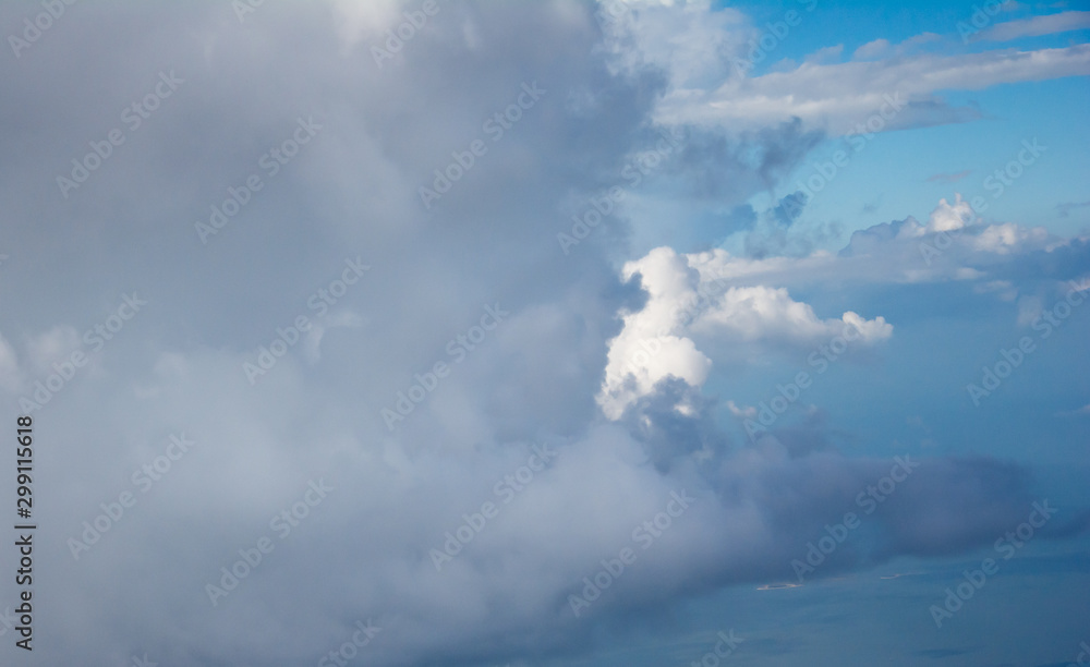  See the white clouds in the blue sky.Blue sky background with clouds.
