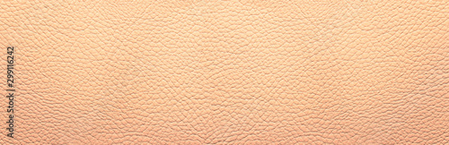 Beige leather background. Panorama.