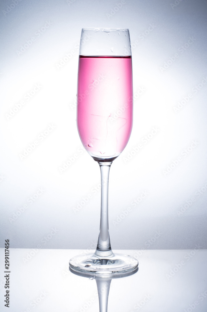 A glass of wine to add water. A glass of wine to add water.