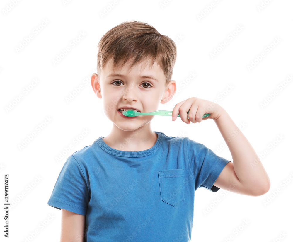 Portrait of little boy brushing teeth on white background Portrait of little boy brushing teeth on white background