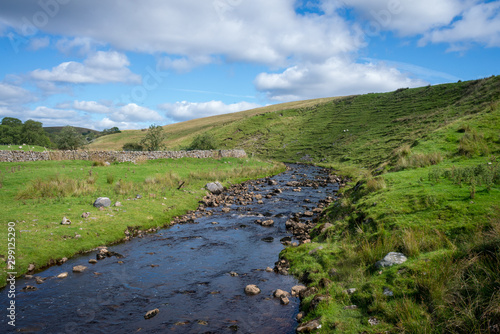 North UK mountain river in Yorkshire a sunny day with nice clouds