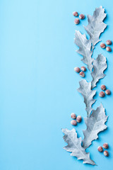 Creative Christmas winter autumn fall composition with decorative leaves
