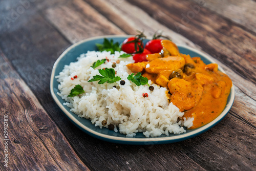 chicken tikka masala and rice basmati photo