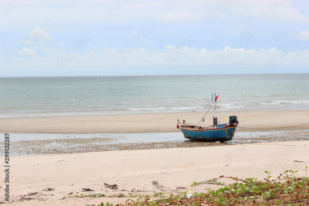 A working fishing boat on the beach
