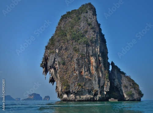 rock emerging from the sea in thailand