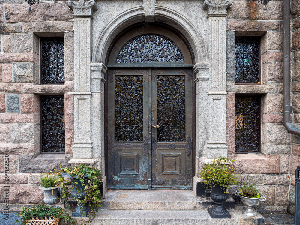 Metallic entrance door to the vintage building
